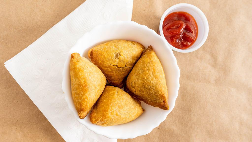 Vegetable Samosa (2 Pieces) · Crispy pastries filled with potatoes, peas and spices.