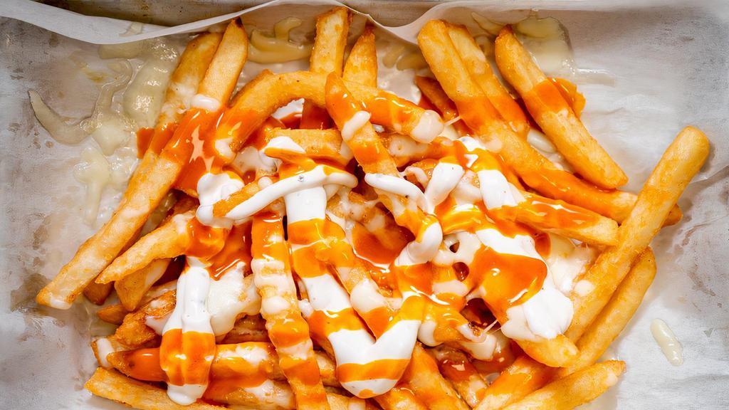 Buffalo Ranch Fries · Hand Cut Fries served with ranch and original hot sauce.