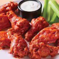 Double Crunch Bone-In Wings · Twice battered and fried, these crisp outside, tender inside wings are tossed in your choice...