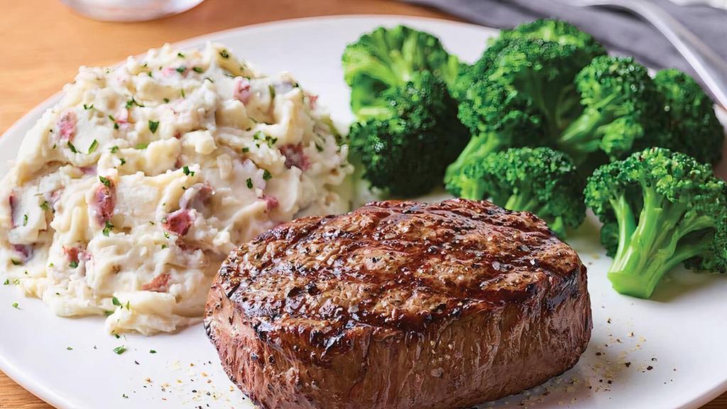 8 Oz. Top Sirloin* · Lightly seasoned USDA Select top sirloin* cooked to perfection and served hot off the grill. Served with garlic mashed potatoes and steamed broccoli.