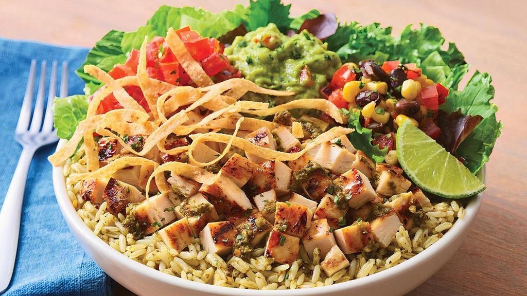 Southwest Chicken Bowl · Grilled chipotle lime chicken on mixed greens and cilantro rice with house-made pico de  gallo, black bean corn salsa and guacamole. Topped with chimichurri, tortilla strips and  a fresh lime wedge.
