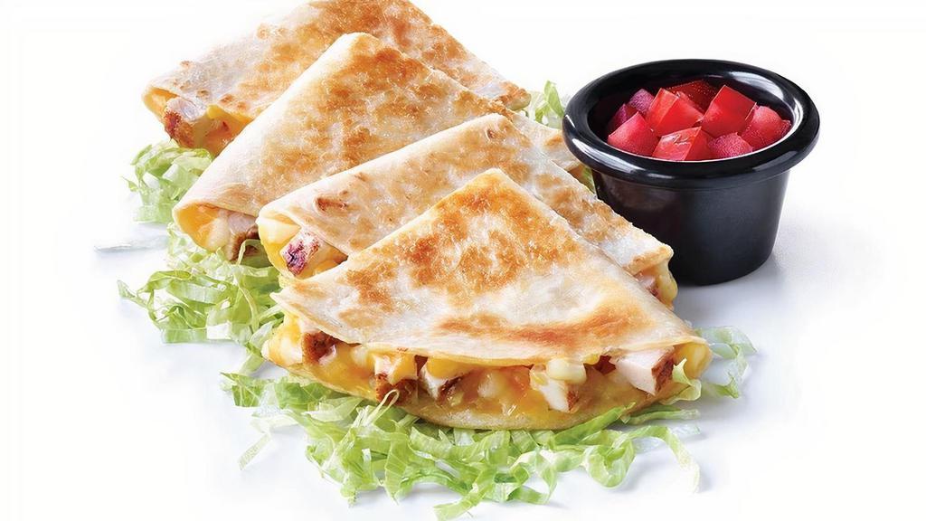 Kids Chicken Quesadilla · A flour tortilla filled with chicken and ooey, gooey melted Cheddar cheese. Served with lettuce and tomatoes.