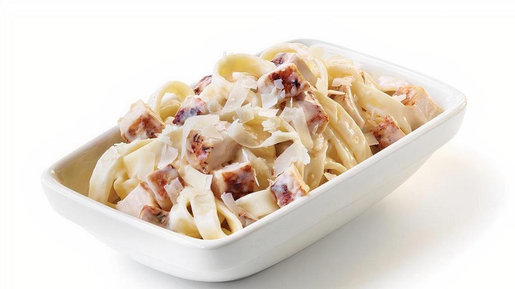 Kids Grilled Chicken Alfredo · Oodles of noodles covered with a creamy Alfredo sauce, then tossed with diced chicken and sprinkled with shredded Parmesan cheese.