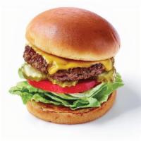 Kids Cheeseburger · Ground beef burger served on a toasted bun with American cheese, lettuce, tomato and pickles .