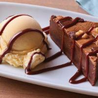 Brownie Bites · The perfect size of a warm dark chocolate brownie with nuts served with vanilla ice cream an...