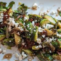 Brussels Sprouts · Warm & crispy sprouts, shallots & bacon tossed in a sweet & tangy balsamic dressing. Topped ...