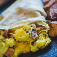 The Breakfast Crepe · Scrambled eggs, cheddar & choice of applewood bacon, Bostrom Farms maple sausage, andouille ...