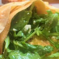Veggie Breakfast Crepe · Scrambled Eggs sauteed vegetables,  and feta-Arugula Salad wrapped in a crepe with crispy Re...