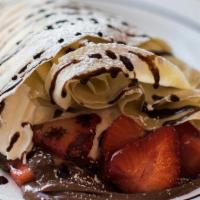 Nutella Fruit Crepe · Nutella & fresh strawberries or sautéed bananas with chocolate sauce, whipped cream & vanill...