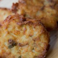 Hashbrown Patties · Three patties stuffed with cheddar and scallions. Served with sour cream.