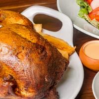 Family Style 2 Chickens · 2 whole chickens, Salad, choice of yucca or french fries and 2 large Sides