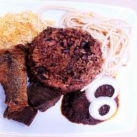 Waakye · Brown rice and beans serve with goat meat or fried fish, beef or mix.