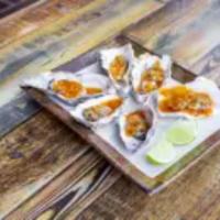 Steamed Oysters · Choice of: Juicy Cajun, Garlic Butter, Lemon Pepper, Aloha Special.