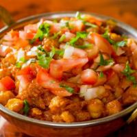 Chana Masala · Served with basmati rice & vegetable of the day or daal.