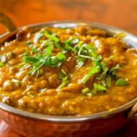 Daal Makhani · Black lentils cooked & tomato based gravy.