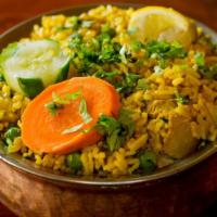 Vegetable Biryani · Made with basmati rice.