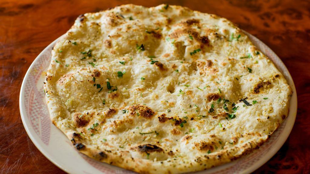 Naan · Garlic/Kandahari/Onion Keema /Cheese.