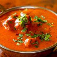 Chicken Tikka Masala · Served with basmati rice & vegetable of the day or daal.