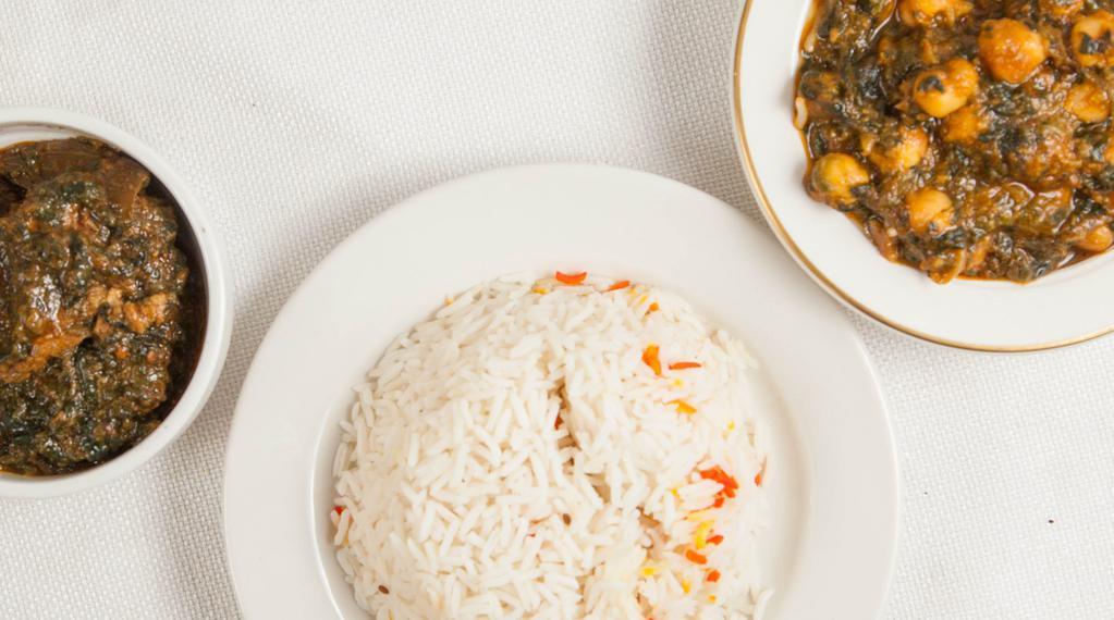 Lamb Saagwala · Served with basmati rice & vegetable of the day or daal.