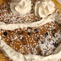 Chocolate Chip Pancakes · Loaded with chocolate chips!  Topped with powdered sugar.