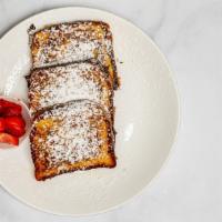 Classic French Toast · Three slices of thick egg bread dipped in our secret sweet batter. Served golden brown with ...