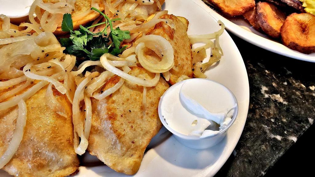 Pierogies, Potato (6) · Sautéed and topped with onions. Your choice of sour cream or apple sauce or both.