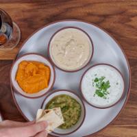 Dipping Plate · Matbucha and hot pepper dip / Tahini with lemon & parsley / Tzatziki with yogurt & cucumbers...