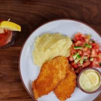 Chicken Schnitzel · olive oil mashed potatoes & israeli salad with cured lemon. Contains gluten.