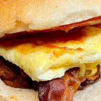 Breakfast Sandwich · Favorite. Two eggs, cheese and choice of meat on a kaiser roll.