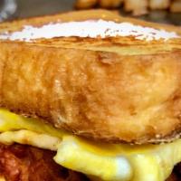 Sweet Guy Sandwich · Eggs, cheese and choice of meat on a French toast.