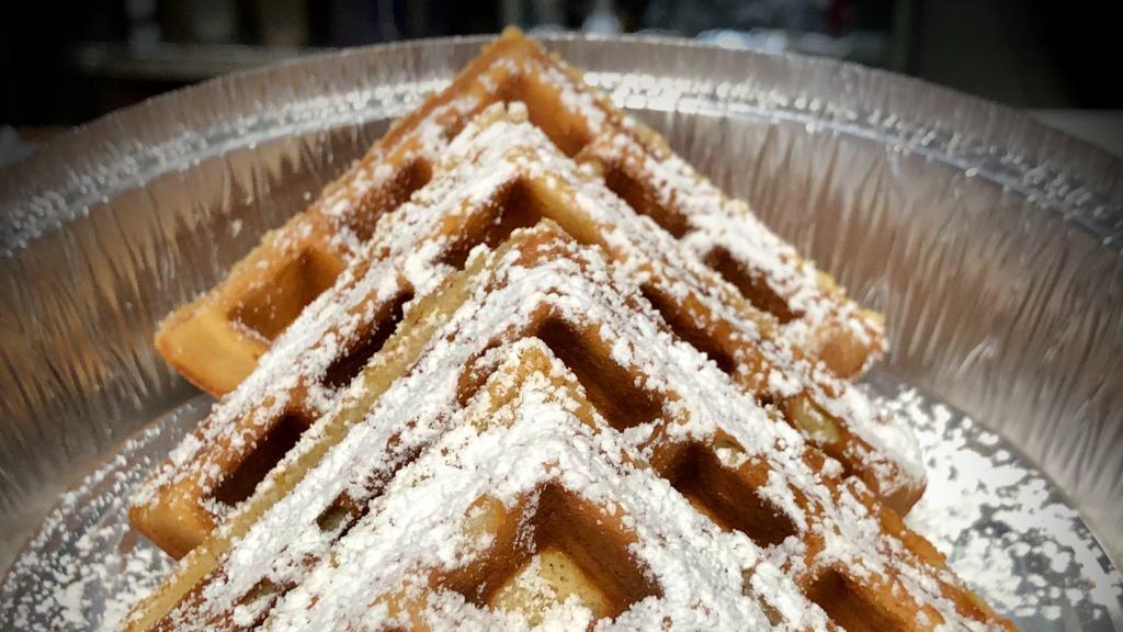 Waffle Side · Belgian waffle with powder sugar, butter and syrup on the side.