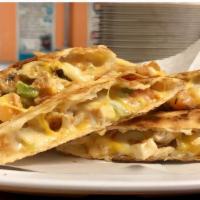 Quesadilla · Favorite. Cheddar, Monterey jack cheese, pico de gallo and homemade chipotle sauce on a a wh...