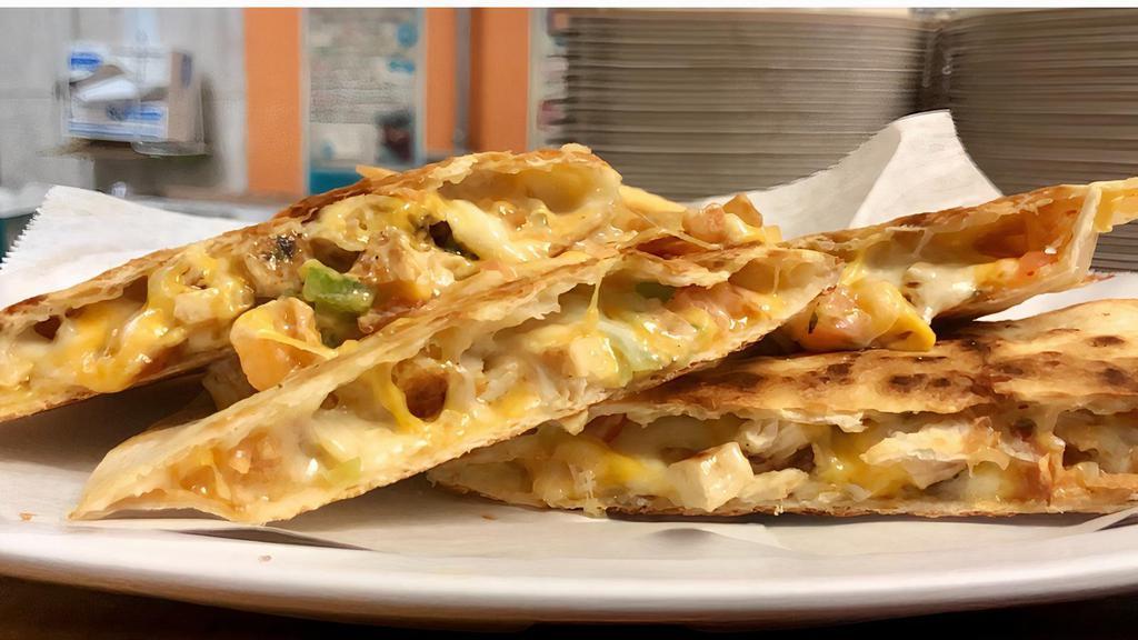 Quesadilla · Favorite. Cheddar, Monterey jack cheese, pico de gallo and homemade chipotle sauce on a a white tortilla, served with sour cream and salsa on the side.