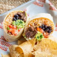Mac Daddy Steak. · Grilled steak, Tito’s cheeses, rice, black beans, sour cream, pico, and our fresh guac.  For...