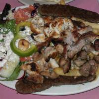 Special Combo Platter · Gyro, pork souvlaki, and chicken souvlaki served with Greek salad, french fries, pita bread,...