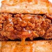 Spicy Honey Butter Chicken Buttermilk Biscuit · Boneless fried chicken breast topped with our house-made honey butter and hot sauce, served ...