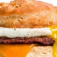 Impossible Sausage, Egg & Cheese Buttermilk Biscuit · Vegetarian sausage patty, egg, cheddar cheese, and tomato jam on a buttermilk biscuit