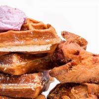 Classic Chicken & Waffles · 2 bone-in pieces of fried chicken paired with a whole waffle. Served with hot sauce, maple s...