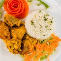 Curry Chicken Combo · Served with rice and vegetables.