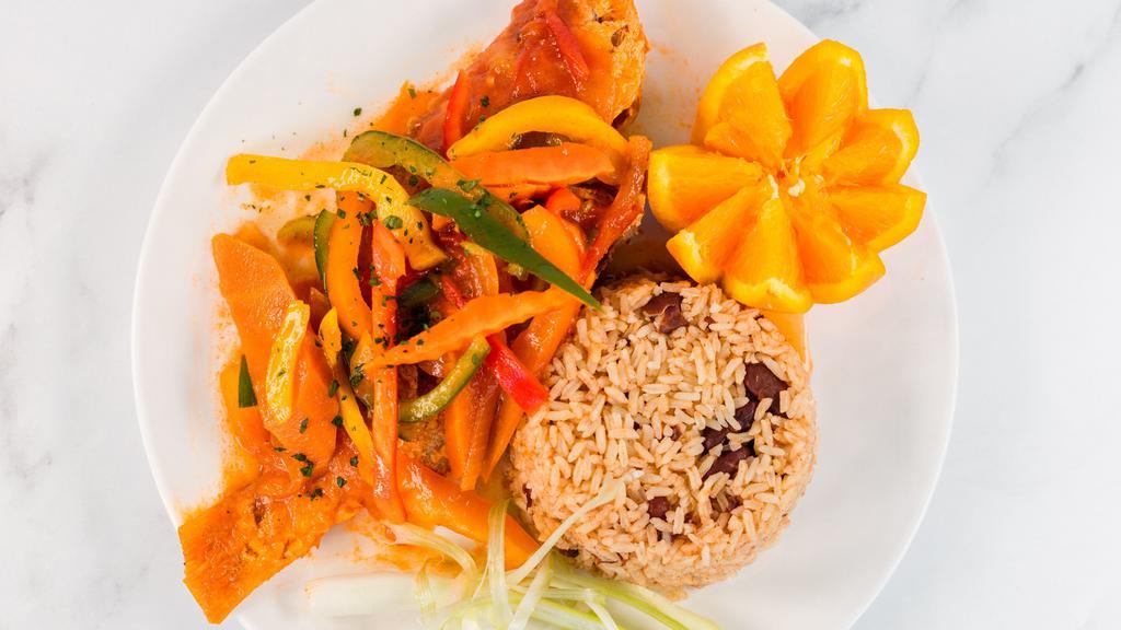 Medium Stew Fish Combo · Served with rice and vegetables.