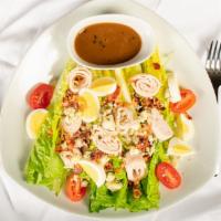 Cobb Salad
 · Romaine Lettuce, Turkey, Bacon, Hard Boiled Egg and Crumble Blue Cheese with Blue Cheese Dre...