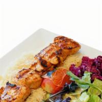 Chicken Shish · Tender chunks of chicken marinated with blend of herbs, spices, served with rice and salad.