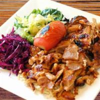 Chicken Gyro (Doner) · Thinly sliced chicken, cooked on rotation spit served with rice and salad.