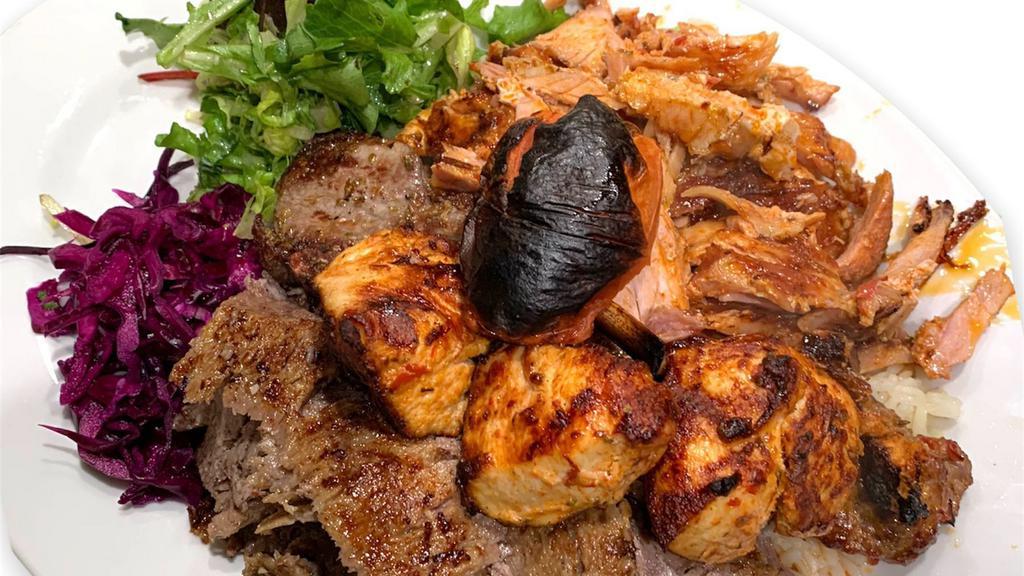 Mix Grill · Lamb gyro, chicken gyro, chicken shish kebab, lamb Adana, lamb chop served with rice and salad.