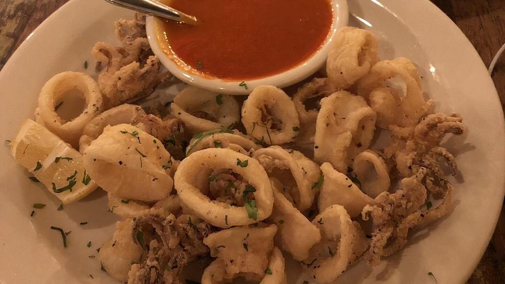 Fried Calamari · Roasted red pepper with tomato sauce.