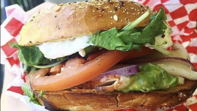Tube Bagel · Vegetarian. Toasted everything bagel with avocado, red onion, Cream cheese, tomato turkey breast, and mesclun salad.