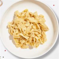 Byo Fettuccine · Fresh fettuccine cooked with your choice of sauce, veggies, and meats and topped with black ...