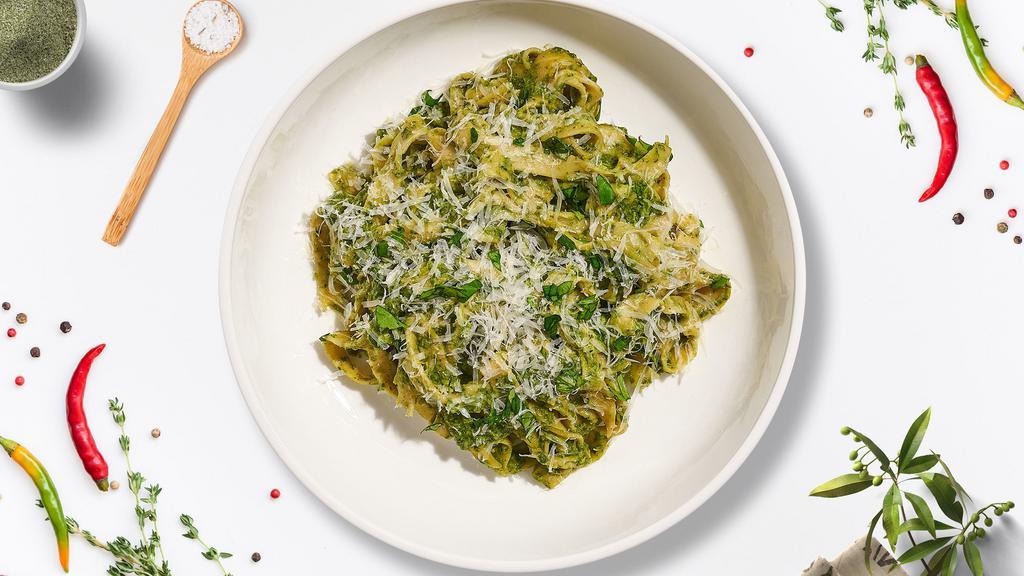 Planet Pesto Pasta  · (Vegetarian) Fresh fettuccine pasta cooked in a pesto sauce and topped with black pepper, parsley, and parmesan.