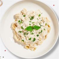 Heaven Carbonara  · Classic Italian pasta dish made with eggs, Parmigiano-Reggiano cheese, Bacon, and black pepp...