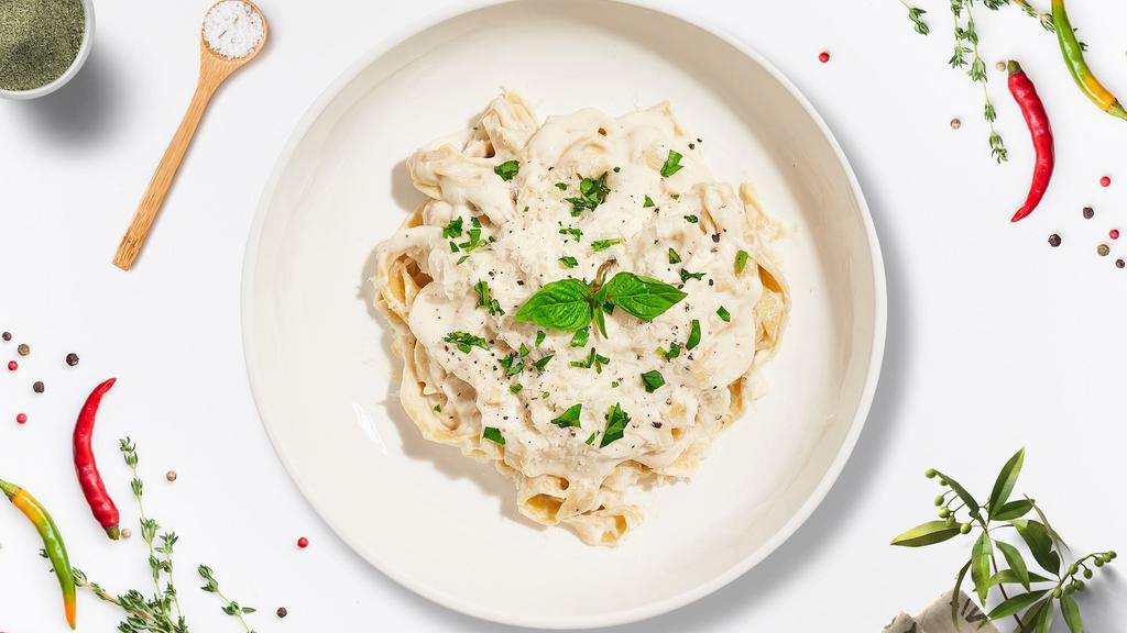 Heaven Carbonara  · Classic Italian pasta dish made with eggs, Parmigiano-Reggiano cheese, Bacon, and black pepper.